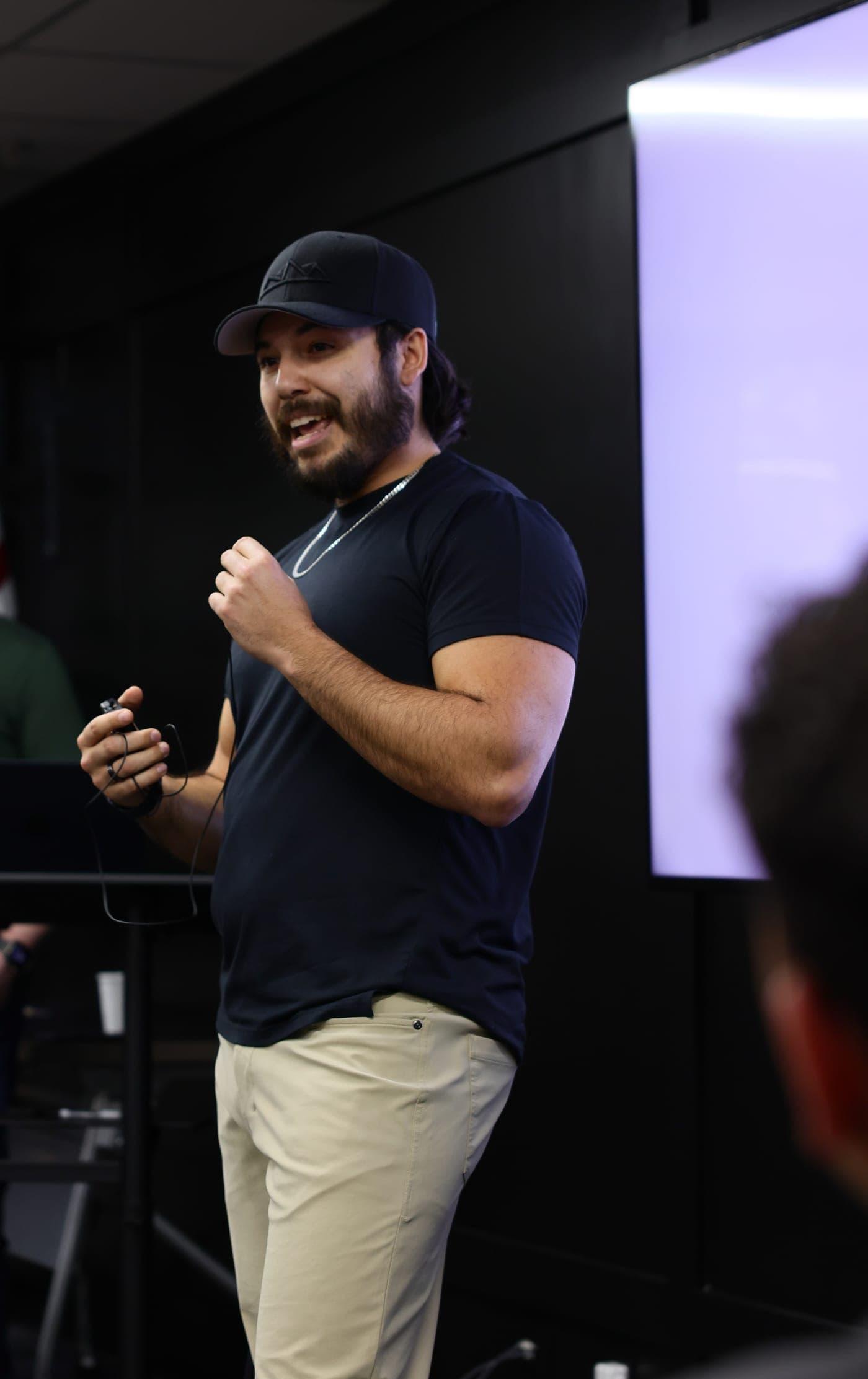 Cory Silva speaking to a room